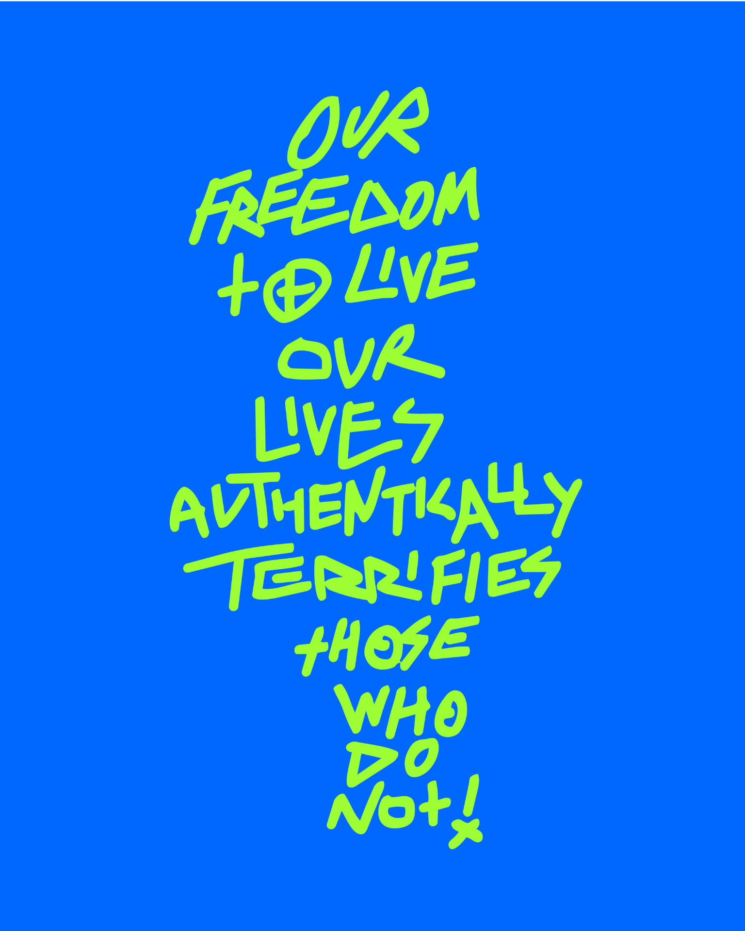 Green marker lettering on blue reading “Our freedom to live our lives authentically terrifies those who do not”